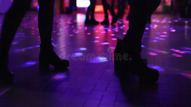 Two women dancing in disco stock video footage